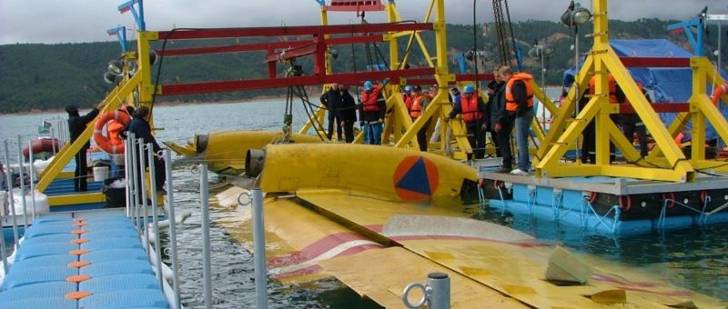 Floating docks used to crane a fire fighter plane